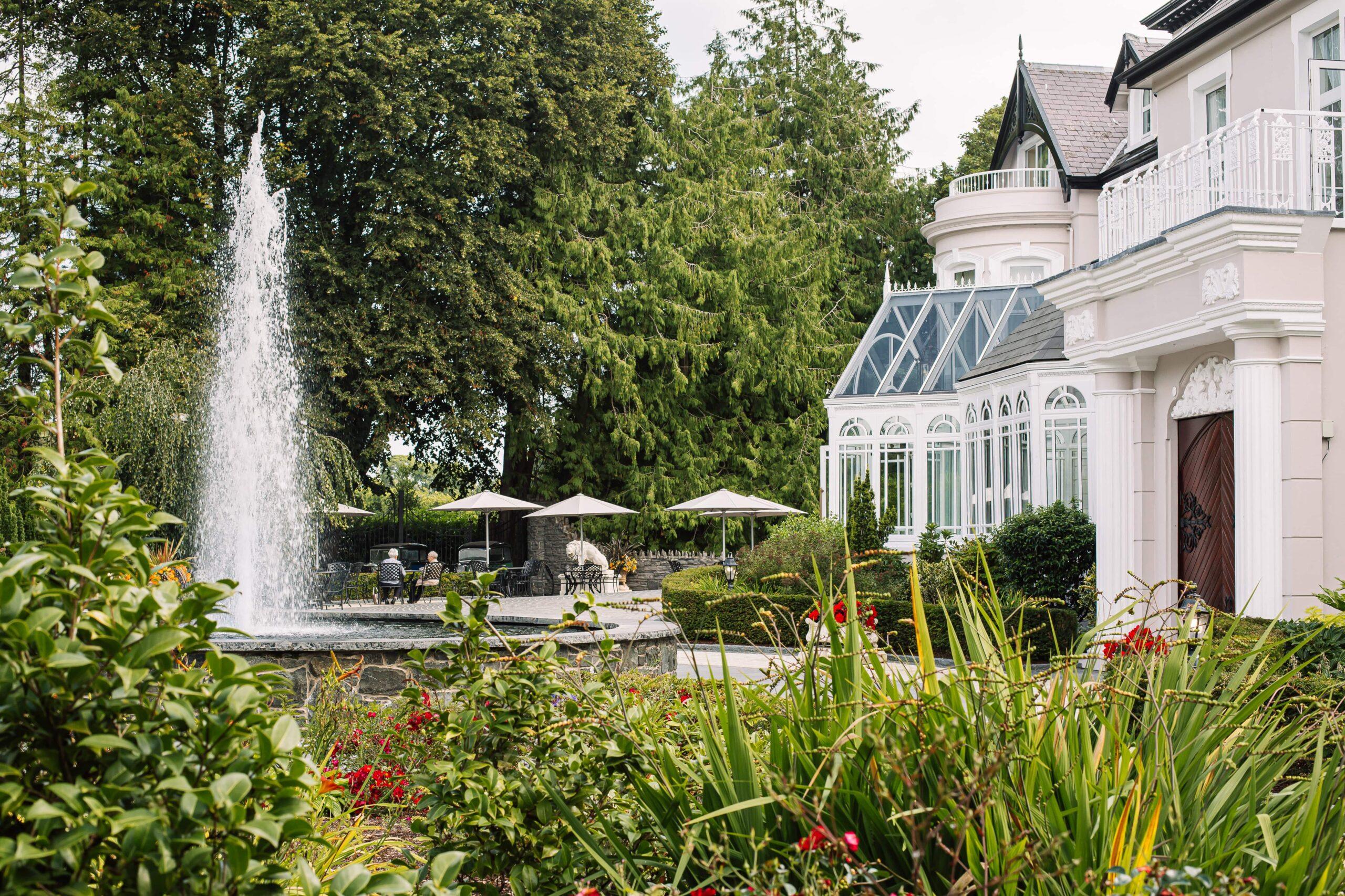 The exterior and gardens of Tullyglass House Hotel with photography by Rapid Agency