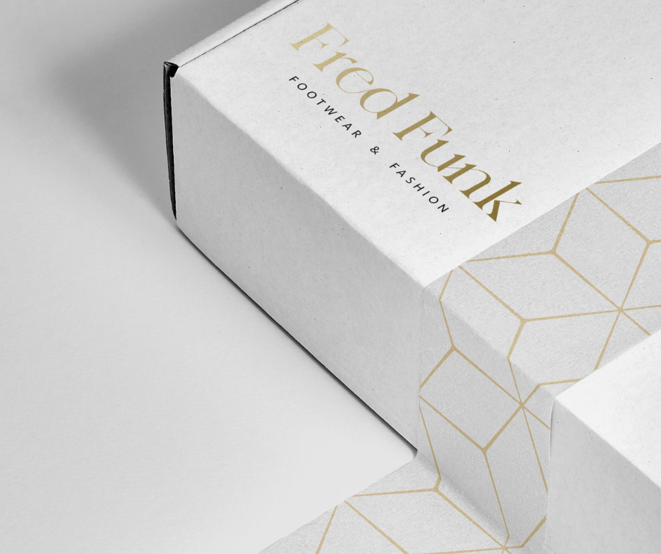 White and gold packaging design for Fred Frunk